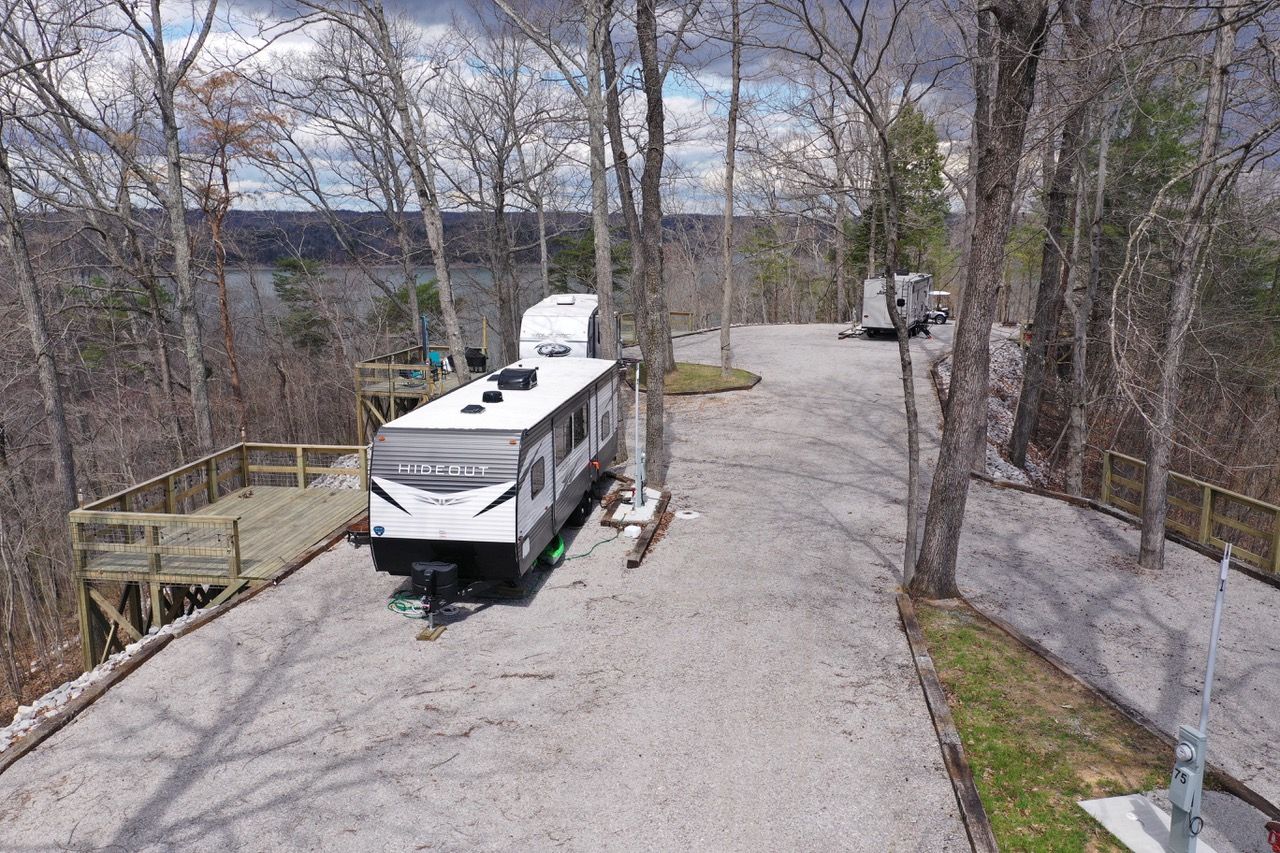 View of RV parking/camping space with balcony over the bluff